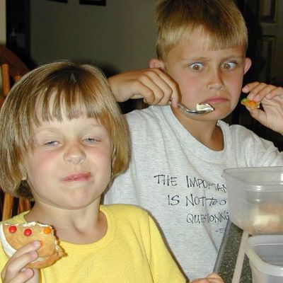 Photo of Kennedy McMann and her brother, Kilian McMaann while having food. 